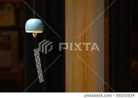 The eaves of a shop where the Japanese summer tradition "Furin" is hung The eaves of a shop where the Japanese summer tradition "Furin" is hung 89203834