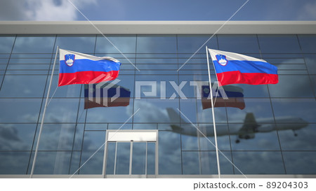 Waving flags of Slovenia in the airport and landing airplane. 3D rendering 89204303