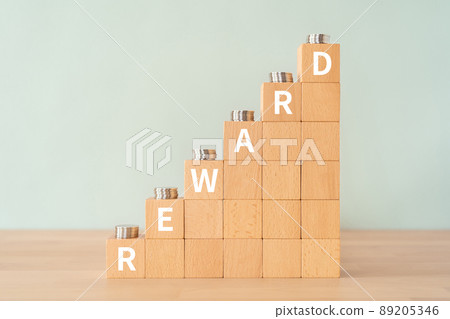 Image of reward | Building blocks and coins with "REWARD" written on them Image of reward | Building blocks and coins with "REWARD" written on them 89205346