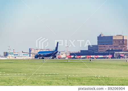 Passenger plane in the airport before the taking off. Passenger plane in the airport before the taking off. 89206904