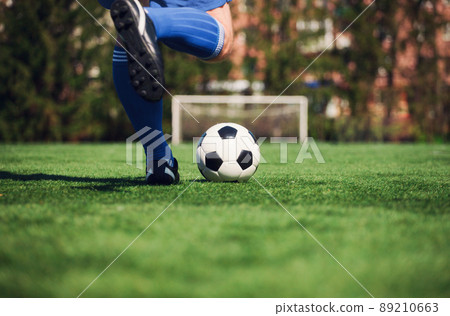 Soccer ball on green playground. Soccer concept Soccer ball on green playground. Soccer concept 89210663