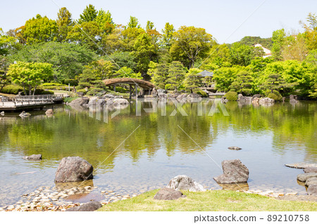 Japanese garden in the fresh green of Kobe City Shiawasenomura 89210758