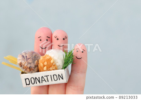 Fingers art of family. Man  and woman holding donation box with food. 89213033
