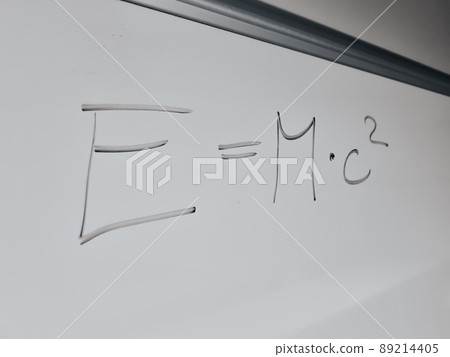 mathematical symbols of an equation from a mathematics lecture on a white board 89214405
