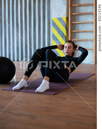 Fit woman doing crunches, abs exercises. Weight loss. Fit woman doing crunches, abs exercises. Weight loss. 89214546