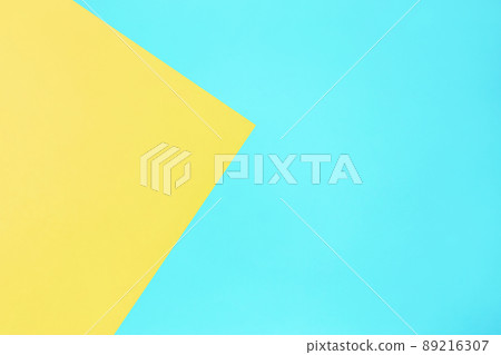 blue and yellow pastel color paper texture top view minimal flat lay background 89216307