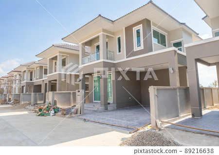construction residential new house in progress at building site housing estate development 89216638