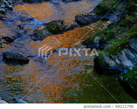 The valley of the Besshi Copper Mine River that shines orange 89222786