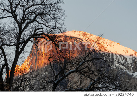 Half dome illuminated by the setting sun 89224740