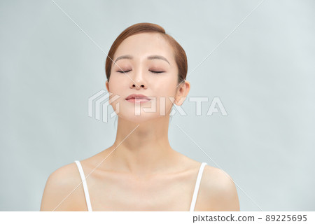 beauty skin care woman on light blue 89225695