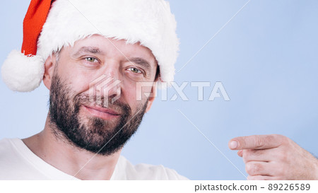 Christmas man pointing with finger at you 89226589