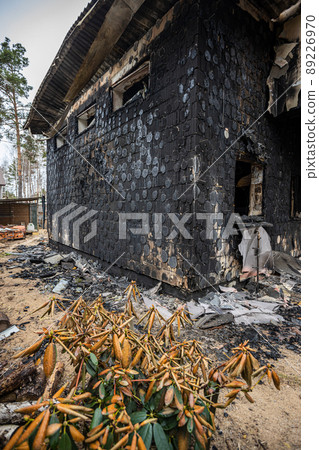 Hostomel, Kyev region  Ukraine - 09.04.2022: Cities of Ukraine after the Russian occupation. Houses that burned down after being hit by rockets, mines. Irpin, Bucha, Gostomel. 89226970