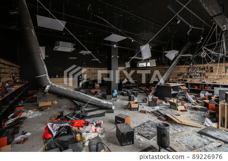 Hostomel, Kyev region  Ukraine - 09.04.2022: Inside the store, which was bombed, was looted by Russian soldiers, occupiers. The looters destroyed the shop. 89226976