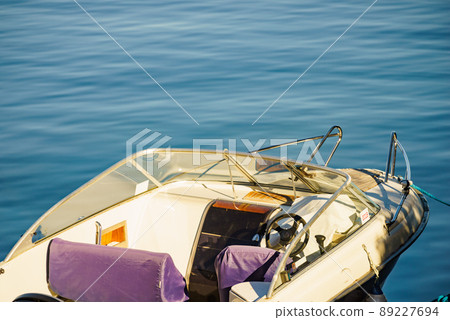 Motor boat on water Motor boat on water 89227694