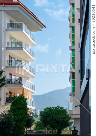 Scenic mountain view between buildings in Alanya, Turkey. Scenic mountain view between buildings in Alanya, Turkey. 89230541