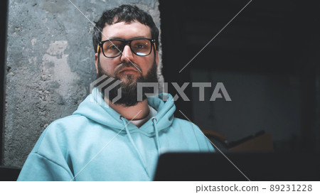 Upset web developer in a bomb shelter Upset web developer in a bomb shelter 89231228