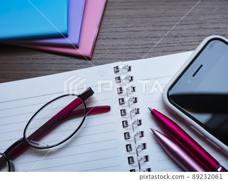 Business image of notebooks, glasses, smartphones (female) 89232061