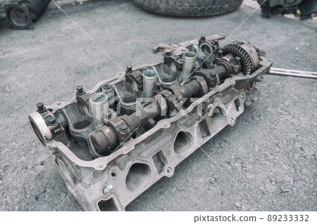 cylinder head lies on asphalt in yard of private house 89233332
