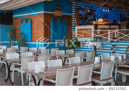 Part of the outdoor summer resort restaurant. Part of the outdoor summer resort restaurant. 89233502