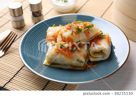 Delicious cabbage rolls served on white wooden table 89235530