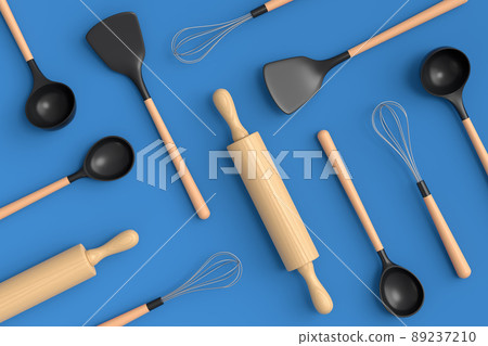 Wooden kitchen utensils, tools and equipment on blue background. 89237210