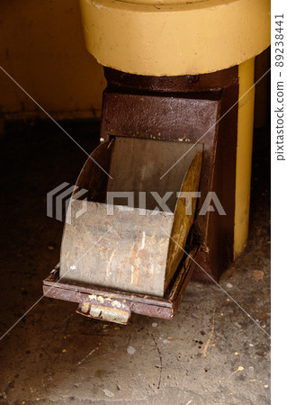 Old garbage chute in apartment building with cheap apartments - Rubbish chute in a Soviet block of flats 89238441