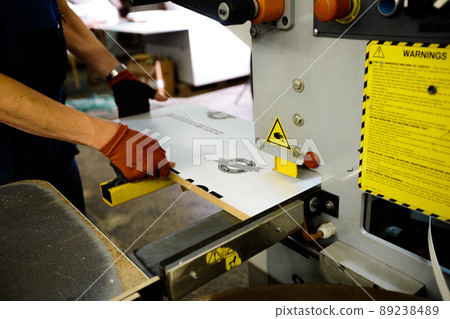 Woodwork and furniture making concept. A carpenter in the workshop doing joinery Woodwork and furniture making concept. A carpenter in the workshop doing joinery 89238489