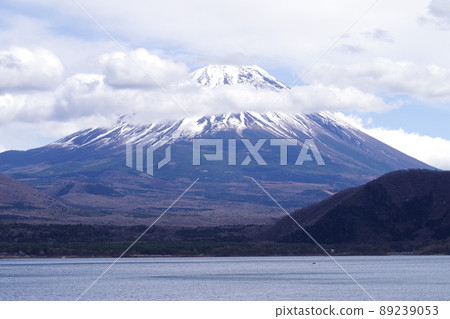 Mt. Fuji on the shore of a lake where snow remains Mt. Fuji on the shore of a lake where snow remains 89239053