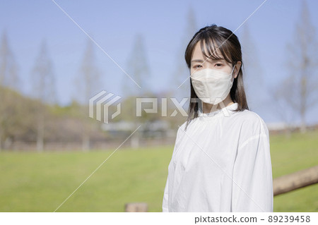 Young lady in mask shape 89239458