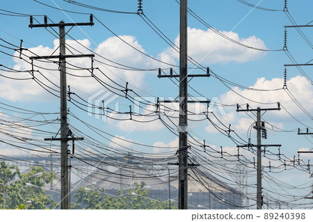 Electric power lines into industrial factory area. 89240398