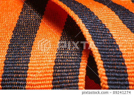 9 may - St. George Ribbon. Isolated on white. The symbol of the Second World war. 9 May Victory Day background. The symbol of the great victory of May 9 9 may - St. George Ribbon. Isolated on white. The symbol of the Second World war. 9 May Victory Day background. The symbol of the great victory of May 9 89241274