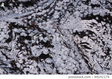 White cristobalite mineral specimens like snowflakes in black obsidian from Wada Pass, Nagano Prefecture 89242174