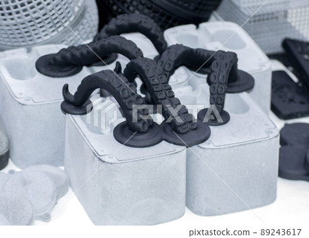 Models printed on 3D printer. Black objects printed on 3D printer made plastic Models printed on 3D printer. Black objects printed on 3D printer made plastic 89243617