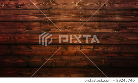 A horizontally long background image in which a dark brown board with wood grain and knots is struck horizontally. 89243740