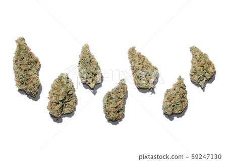 Marijuana buds closeup. Medicinal cannabis flowering on white background, isolated. 89247130