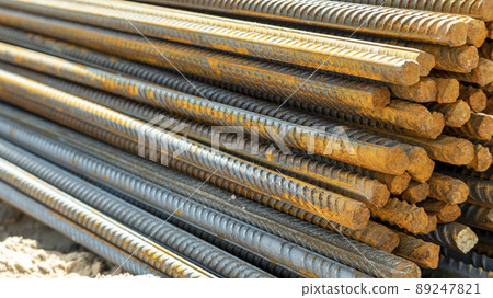 rusty bars of iron rebar on a construction site 89247821