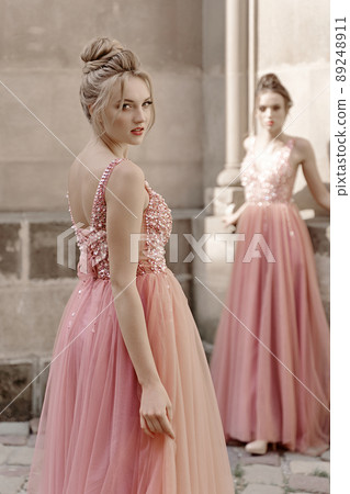 European girls bridesmaids in pink dresses having fun European girls bridesmaids in pink dresses having fun 89248911