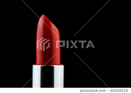 Tube of Red Lipstick Isolated on a Black Background 89249528