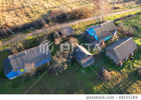 Wooden home in village. Country houses in the countryside. 89255269