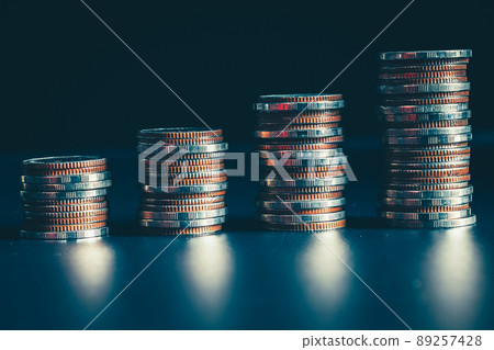 Pile of gold coins stack in finance treasury deposit bank account for saving Pile of gold coins stack in finance treasury deposit bank account for saving 89257428