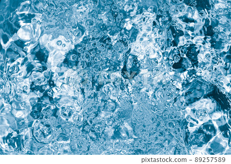 Blue Pool or hot tub water background close up. Ripples on blue transparent water in swimming pool with light reflection. Top view. Summer banner. Blue Pool or hot tub water background close up. Ripples on blue transparent water in swimming pool with light reflection. Top view. Summer banner. 89257589