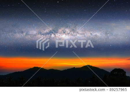 Milky way night landscape sunset light over silhouette mountain hil Milky way night landscape sunset light over silhouette mountain hil 89257965