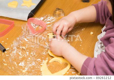 Girl making sweets Girl making sweets 89261212