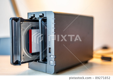 network attached storage NAS with a single bay pulled setup at a home office and remote work redundancy network attached storage NAS with a single bay pulled setup at a home office and remote work redundancy 89271852