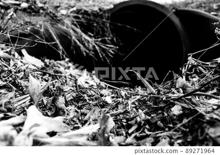 HDPE drainage culvert under a road entrance. Pipe is used to convey stormwater between ditches. 89271964
