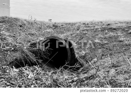 HDPE drainage culvert under a road entrance. Pipe is used to convey stormwater between ditches. 89272020