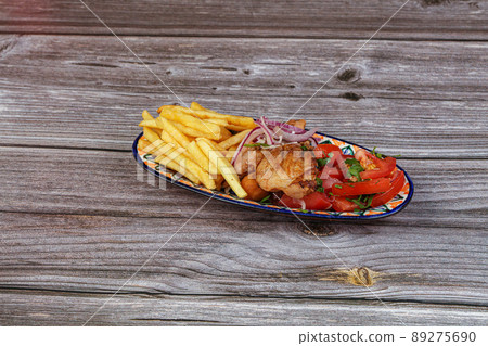 Roasted chicken with fried potato Roasted chicken with fried potato 89275690