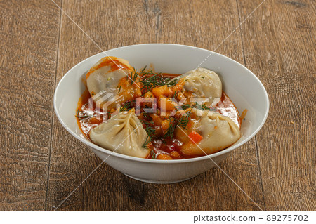 Traditional Uzbek cuisine - manti Traditional Uzbek cuisine - manti 89275702