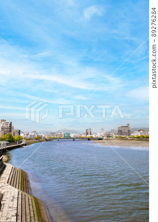I am shooting the direction of Yoshishima and Funairi in the upstream area from the Enami Ohashi bridge over the main river. It is a spacious landscape near the mouth of the river. Hiroshima Prefecture I am shooting the direction of Yoshishima and Funairi in the upstream area from the Enami Ohashi bridge over the main river. It is a spacious landscape near the mouth of the river. Hiroshima Prefecture 89276284