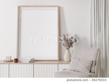 Empty vertical picture frame on white wall in modern living room. Mock up interior in contemporary, scandinavian style. Free, copy space for picture. Console, pampas grass. Close up. 3D rendering. Empty vertical picture frame on white wall in modern living room. Mock up interior in contemporary, scandinavian style. Free, copy space for picture. Console, pampas grass. Close up. 3D rendering. 89276910